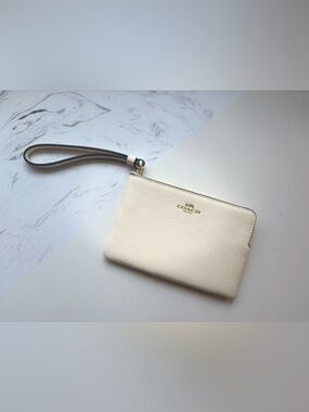 Coach Cream Pebbled Leather Wristlet with Gold Logo